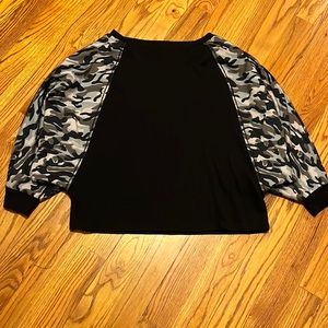 Fun and trendy long sleeve black shirt with camo balloon sleeves